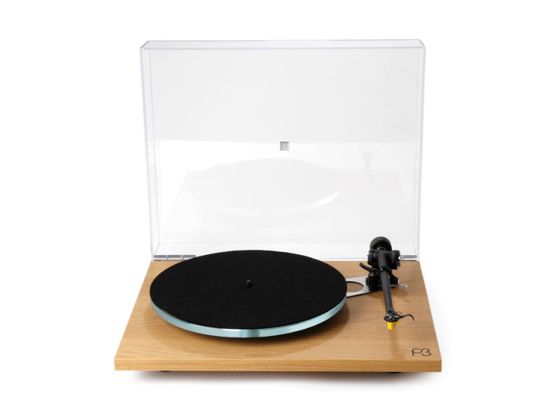 Turntable with wooden plinth and clear dust cover on a white background