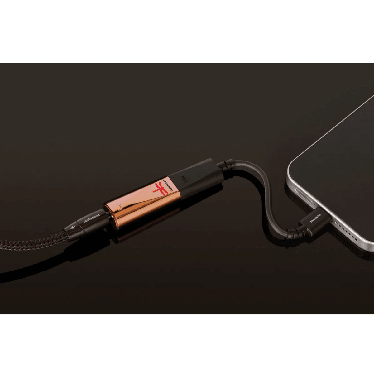 audioquest dragonfly copper dac with usp adapter connected to a phone