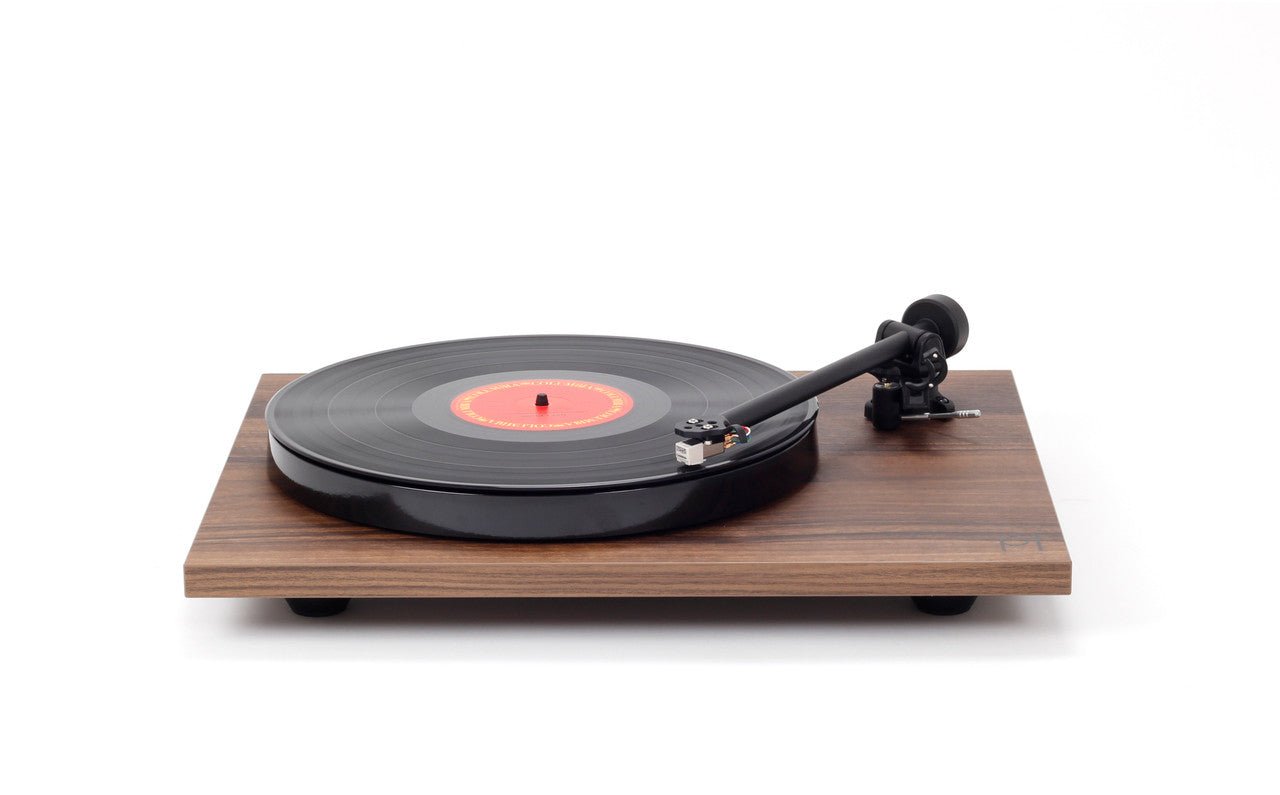 Wooden turntable with a vinyl record on a white background