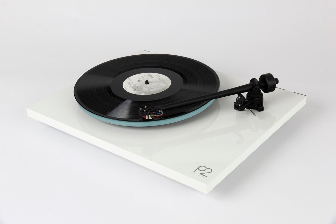 Turntable with a vinyl record on a white background