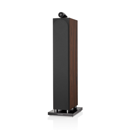 Tall black and wood speaker on a white background