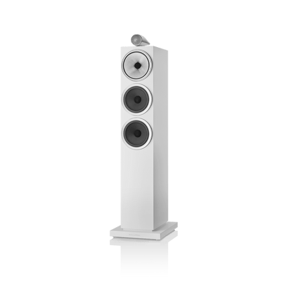 White floor-standing speaker on a black background