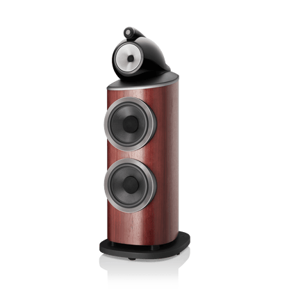 Wooden speaker with black and gray components on a white background