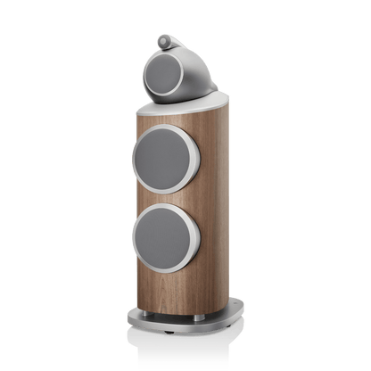 Wooden speaker with gray circular design on a white background
