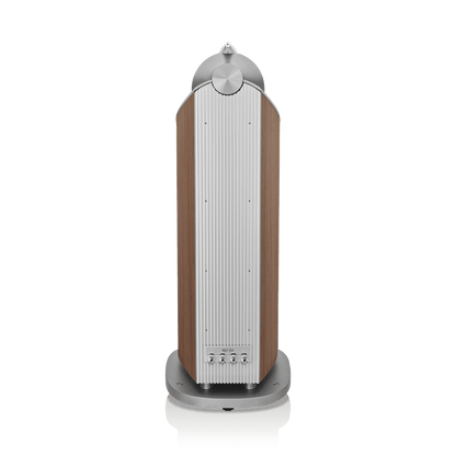 Tall cylindrical object with a wooden finish and metallic top on a white background