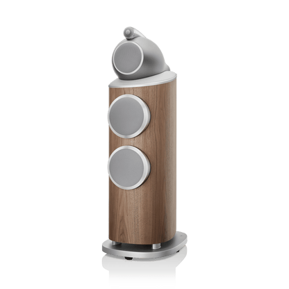 Wooden speaker with gray circular components on a white background