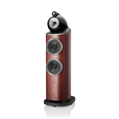 Wooden speaker with black and silver components on a white background