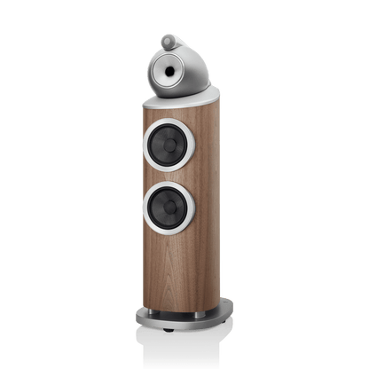 Wooden speaker with silver top on a white background