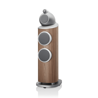 Wooden speaker with gray circular design elements on a white background