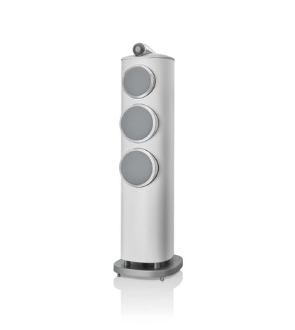 White floor-standing speaker with three circular drivers on a white background