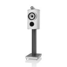 White speaker on a stand with a white background