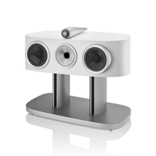 White three-speaker audio system on a white background