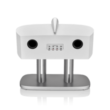 White electronic device with two speakers and a control panel on a white background