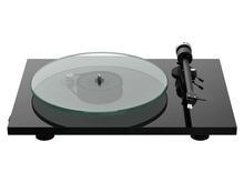 Turntable with glass platter on a white background
