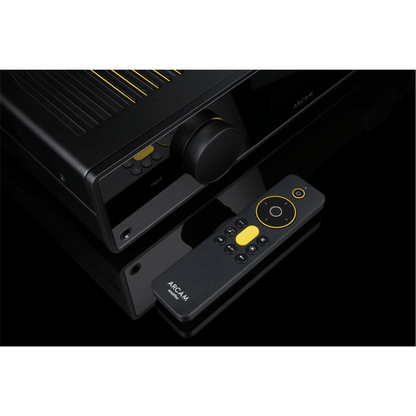 Arcam A50 Signature amplifier with included remote control, close up of input dial and top vents