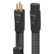 AudioQuest Blizzard power cable with gold-plated three-prong AC plug, IEC connector, silver on black nylon braid jacket and 72v DBS battery pack