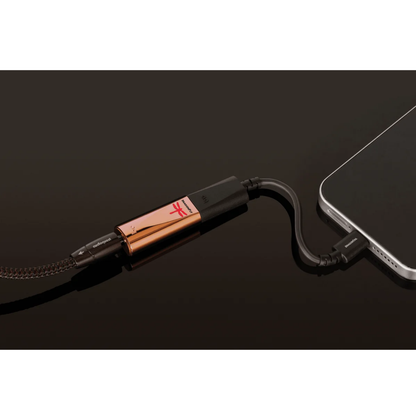audioquest dragonfly copper dac with usp adapter connected to a phone