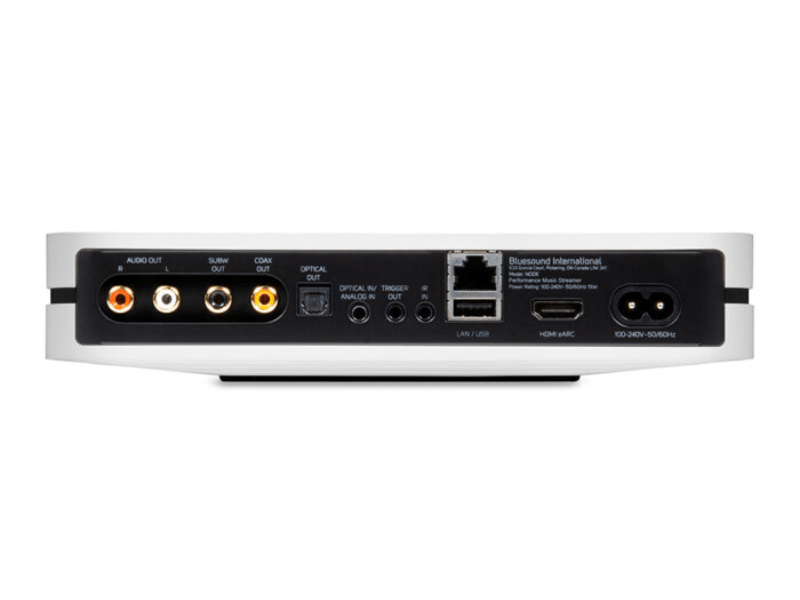 Back panel of a electronic device with various ports on a white background