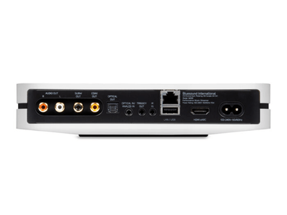 Back panel of a electronic device with various ports on a white background