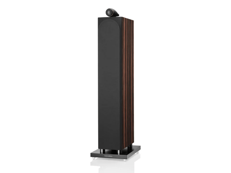 Tall black speaker with wooden accents on a white background