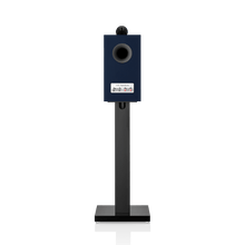 Blue speaker on a stand with a white background