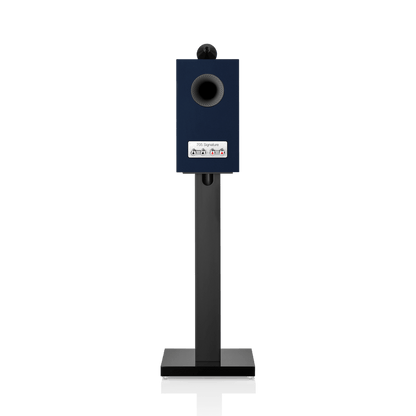 Blue speaker on a stand with a white background