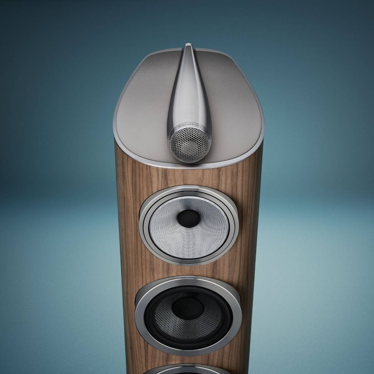 Bowers Wilkins 804 D5 light walnut speaker close up on blue background
