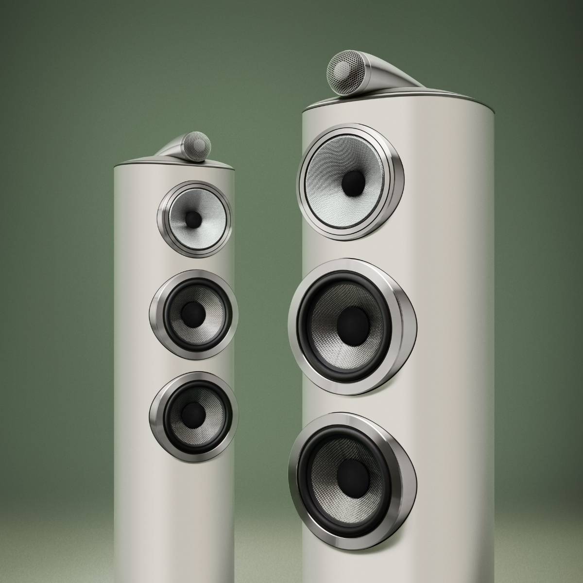 pair of white Bowers Wilkins 804 D5  on green background