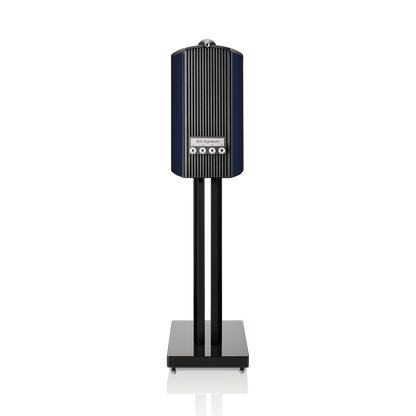 Black electronic device on a stand with visible branding on a white background