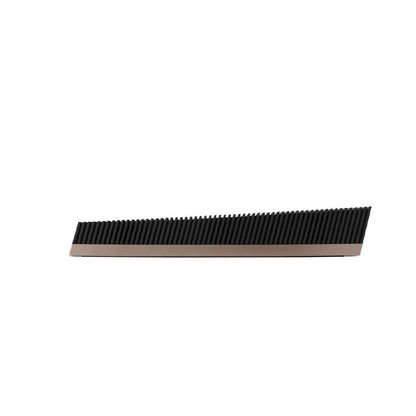 Black rubber comb on a white background