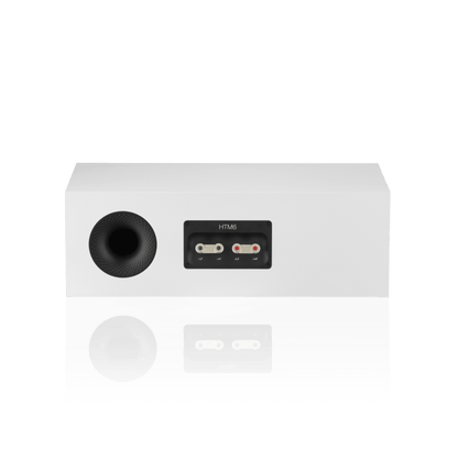 White electronic device with a black circular component on a white background