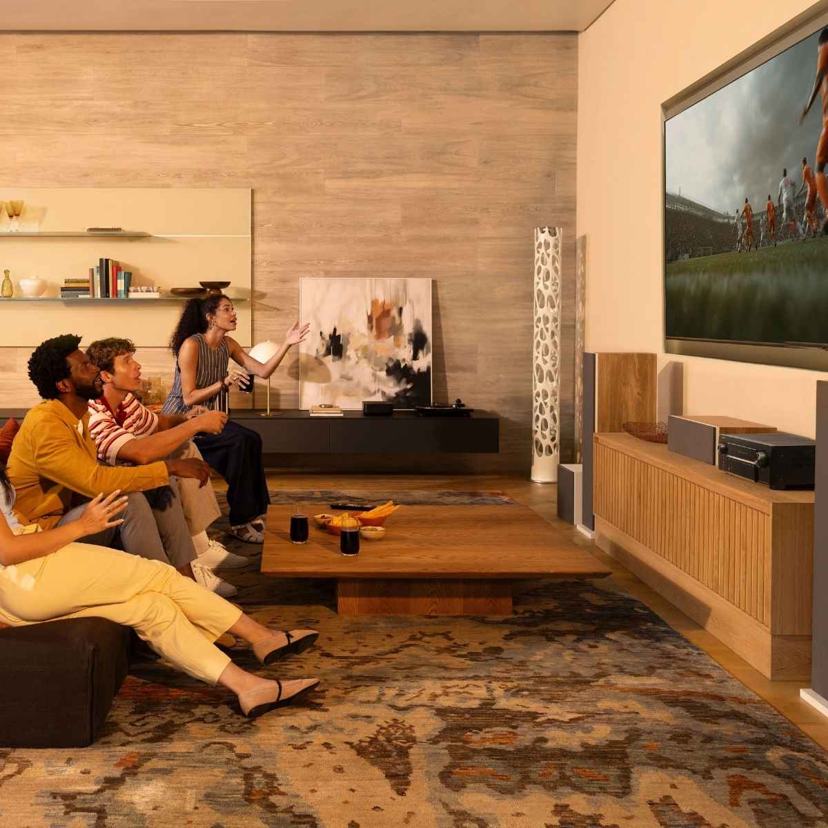 group of people enjoying Denon AVR-X2900H AV receiver 