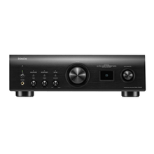 Black Denon audio receiver on a white background

