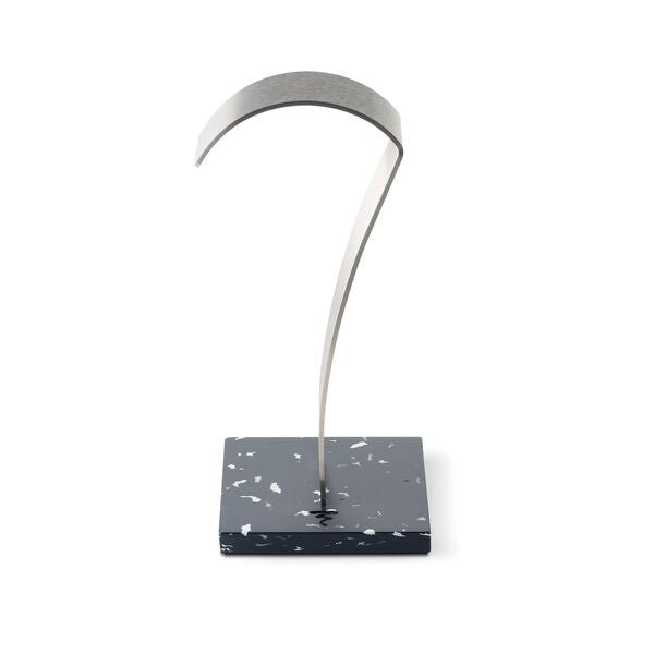 Focal High-Fidelity Headphone Stand with brushed stainless steel arch and recycled polymer base in black finish.

