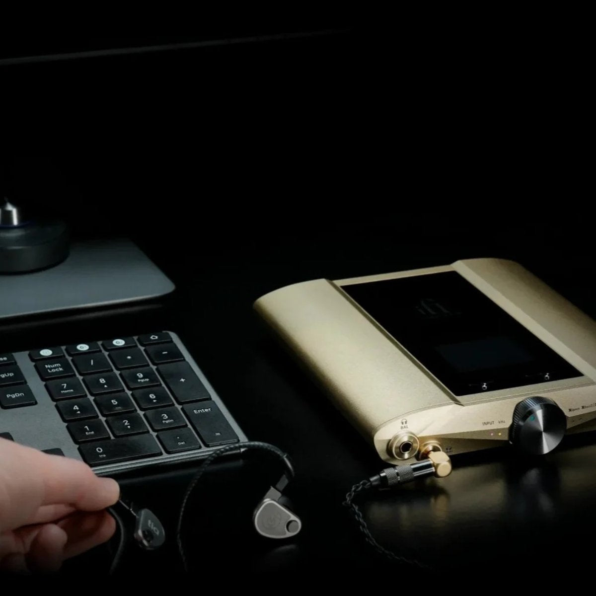 iFi iDSD Valkyrie with earbuds