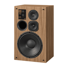 JBL L100 Classic 80 Anniversary Edition loudspeaker in oak veneer without grille, showing 12-inch woofer, 5.25-inch midrange, 1-inch tweeter, and HF/MF level attenuators