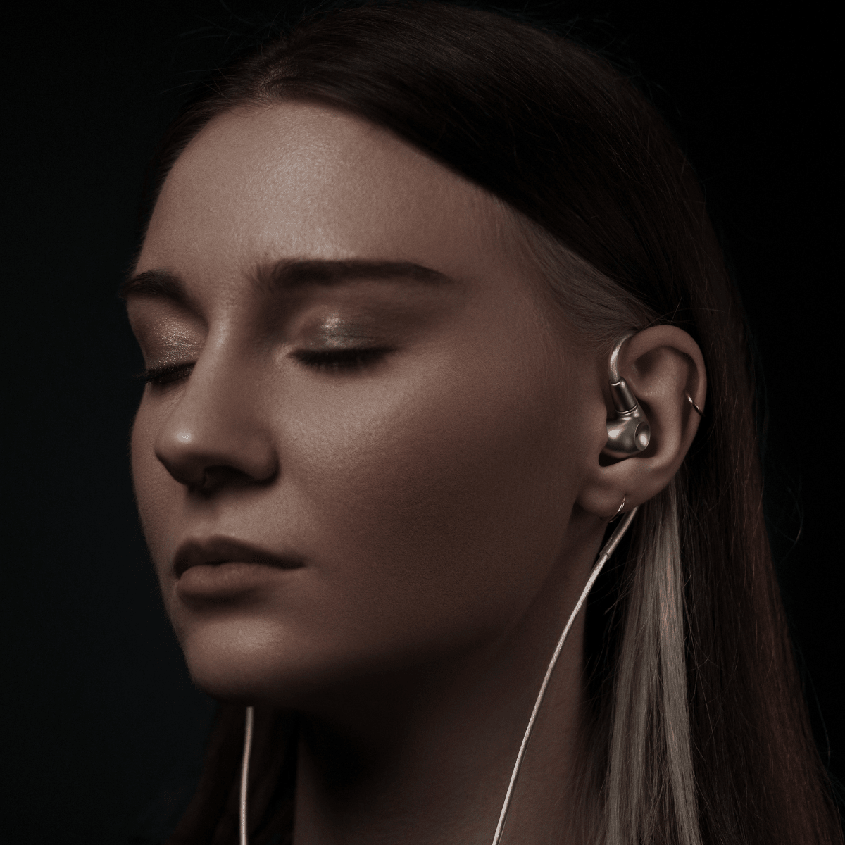 Woman listening Meze Audio Astru IEM