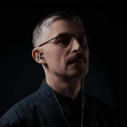 man listening meze audio astru iems