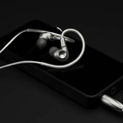 Meze Audio Astru IEM plugged into a dac
