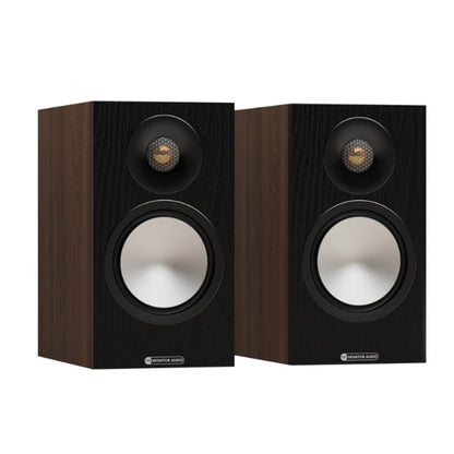 pair of monitor audio bronze 50 7g bookshelf speakers in walnut color