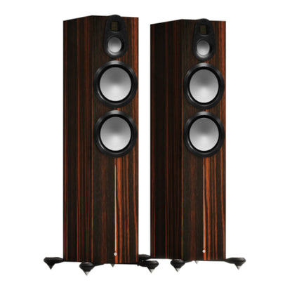 pair of monitor audio gold 500 6g floorstanding speakers in dark walnut