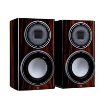pair of monitor audio platinum 100 3g bookshelf speakers in piano ebony color
