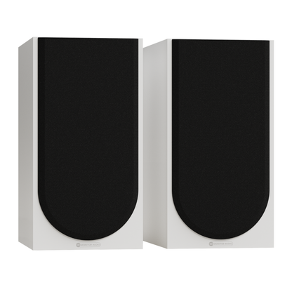 white pair of monitor audio silver 100 8g speakers witil grilles on