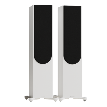 white pair of monitor audio silver 500 8g floorstanding speakers with grilles
