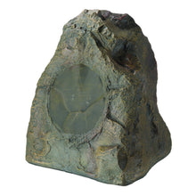 Decorative stone with embedded green stone on a white background