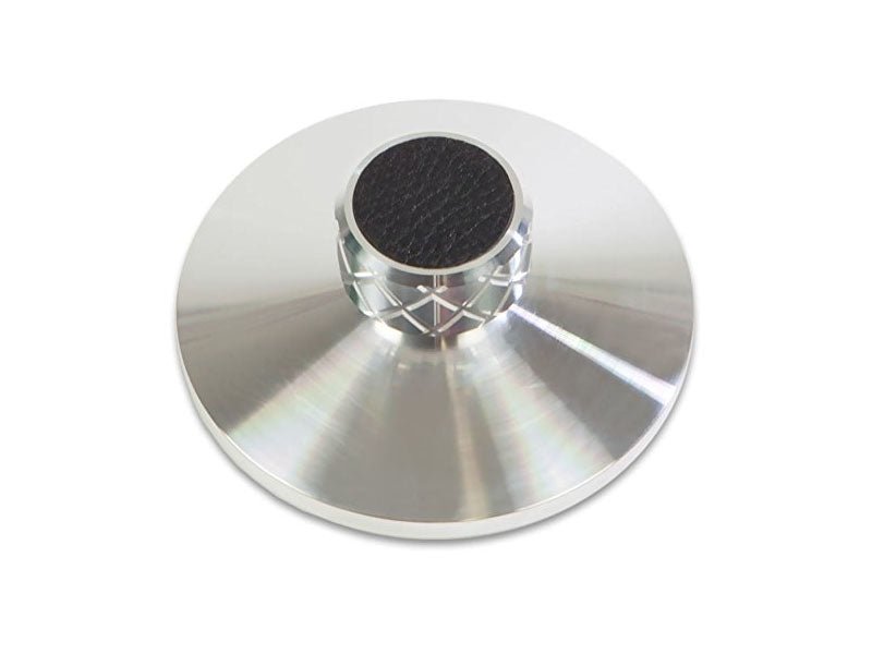 Metallic object with a reflective surface on a white background