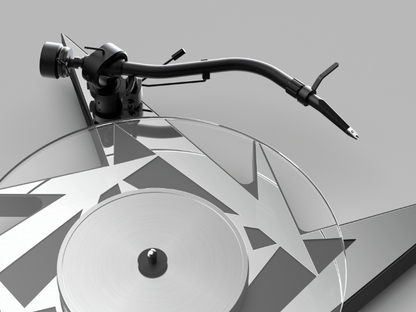 Close-up of a turntable with a stylus on a gray background
