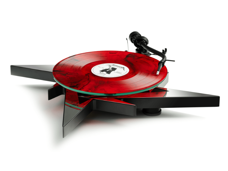 Turntable with a red vinyl record on a white background