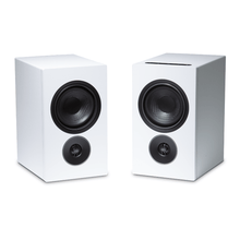 pair of psb iq1 speakers in white