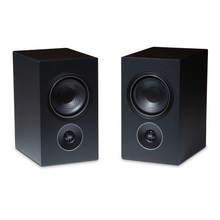 pair of psb iq1 speakers in black
